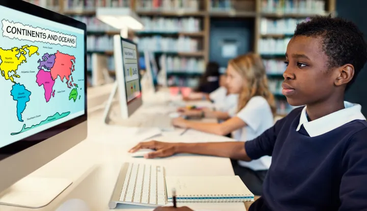 Student using a computer in a school learning centre
