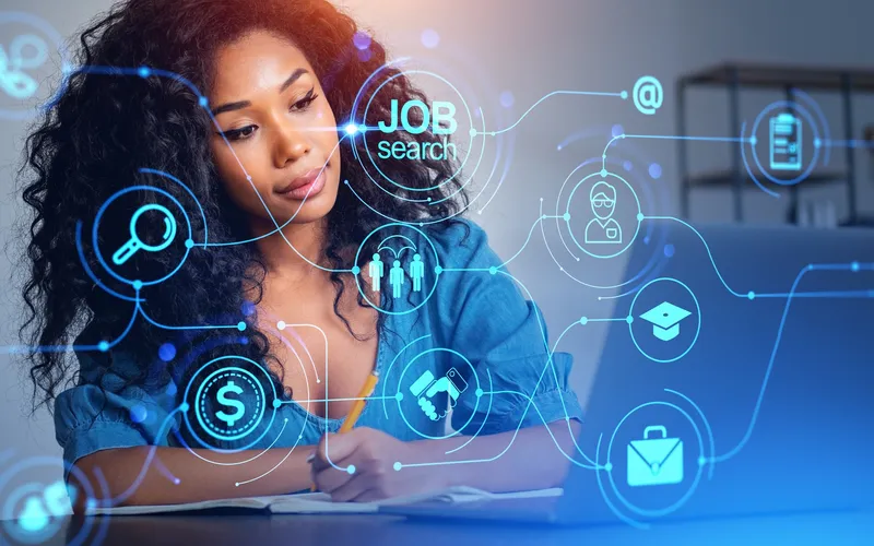 African woman using a laptop with a job-search interface, representing responsible AI in hiring and recruitment