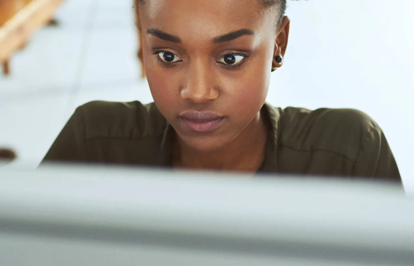 Researcher reviewing evidence and source material on a laptop