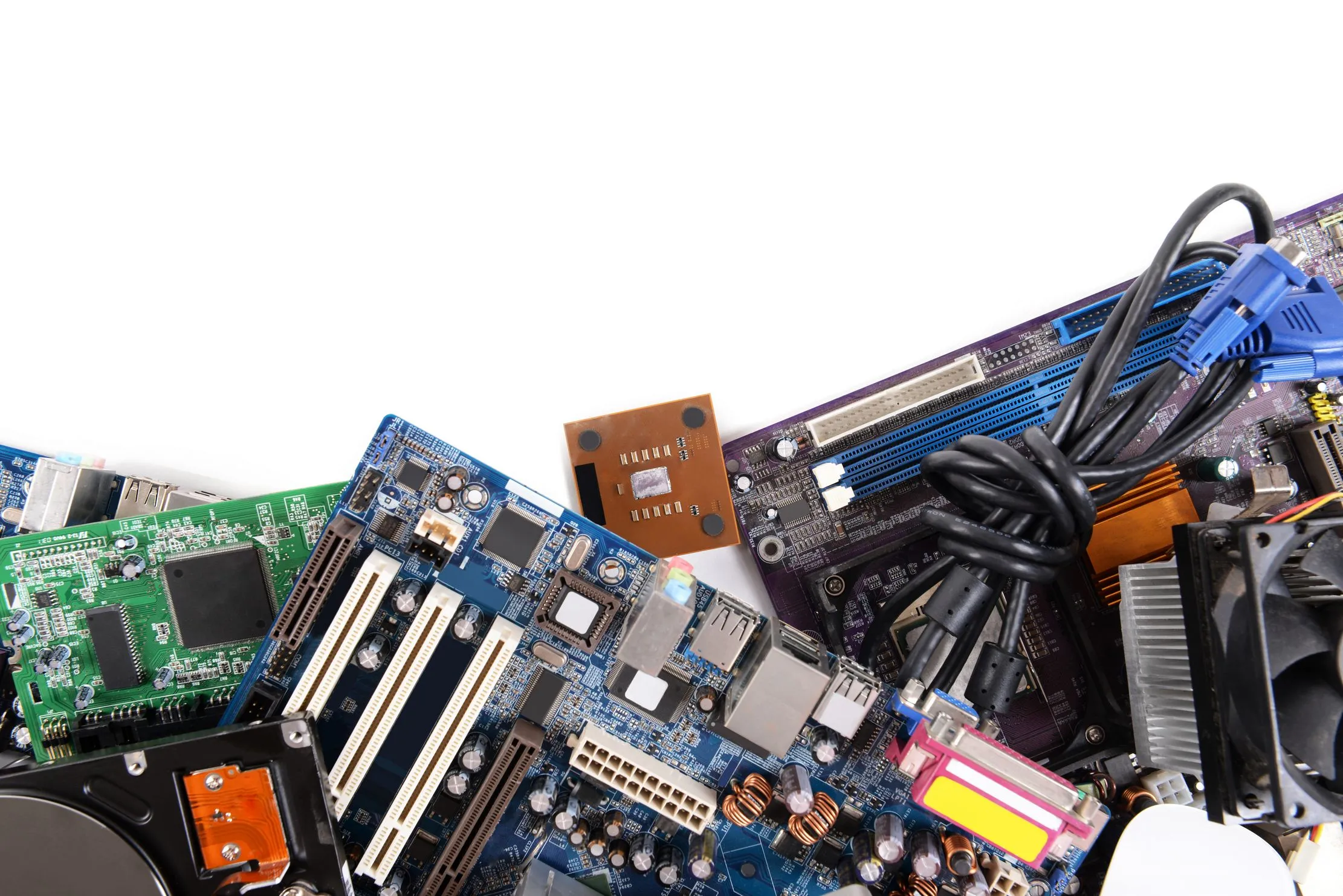 Computer parts arranged separately, illustrating repairability, component reuse and responsible retirement