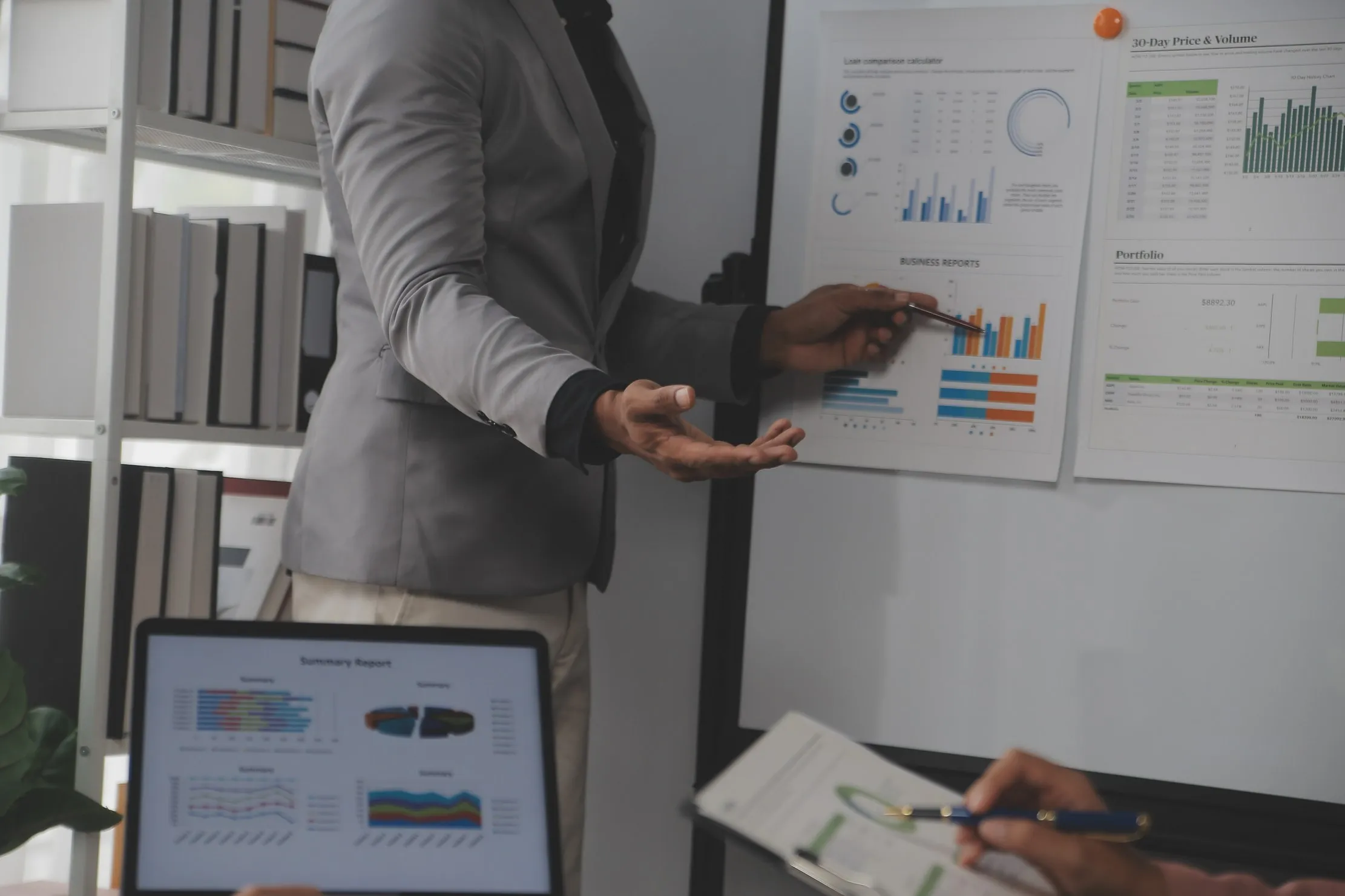 Business leader reviewing financial charts and operational evidence before funding due diligence