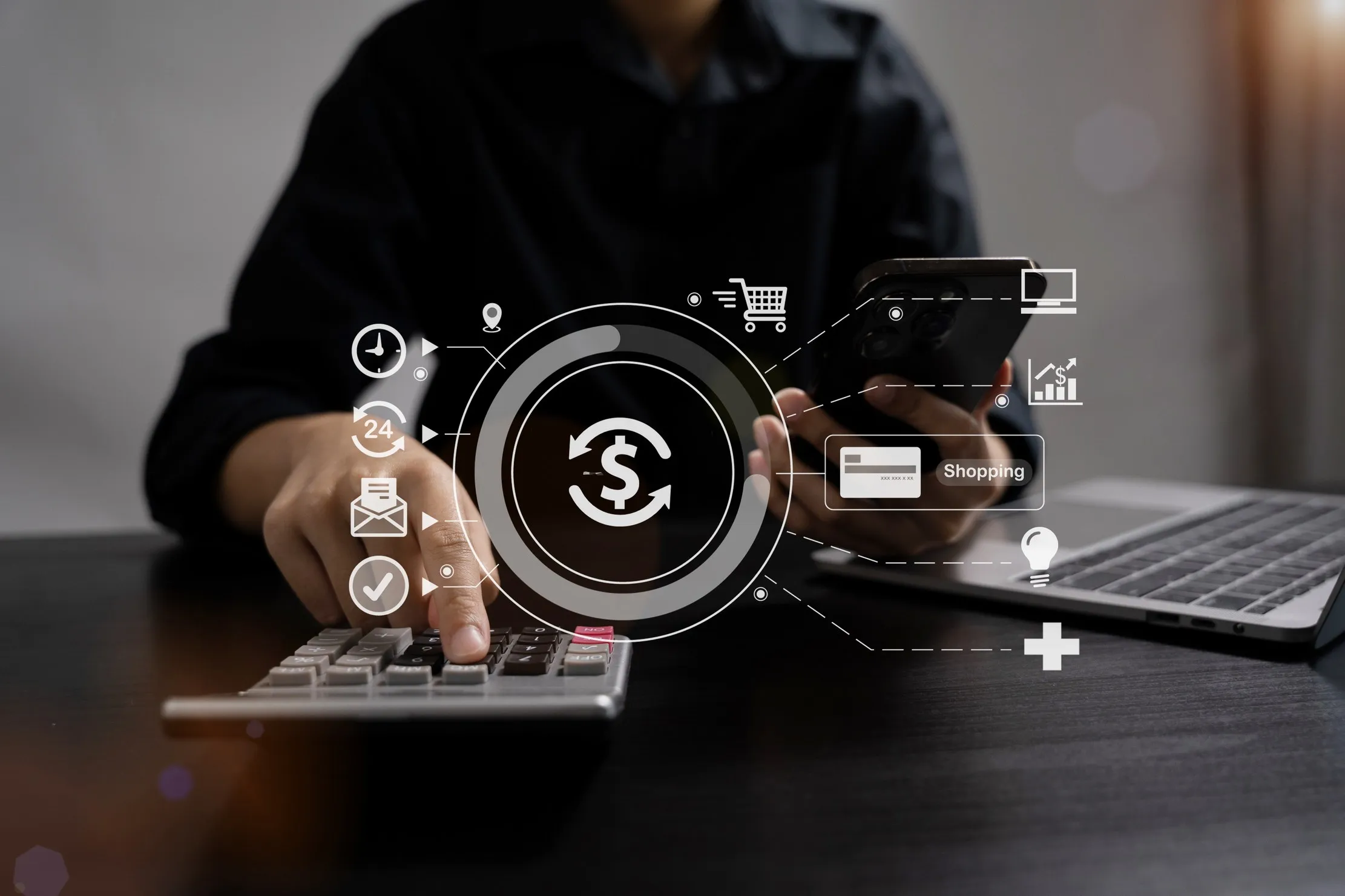 Dirigeant calculant le coût d'investissement d'un système avec une calculatrice et un téléphone, illustrant le coût total de possession