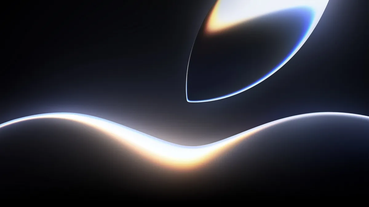 Développeur travaillant sur des appareils Apple pendant WWDC 2026, illustrant l'impact de Xcode 27, Siri AI et Foundation Models